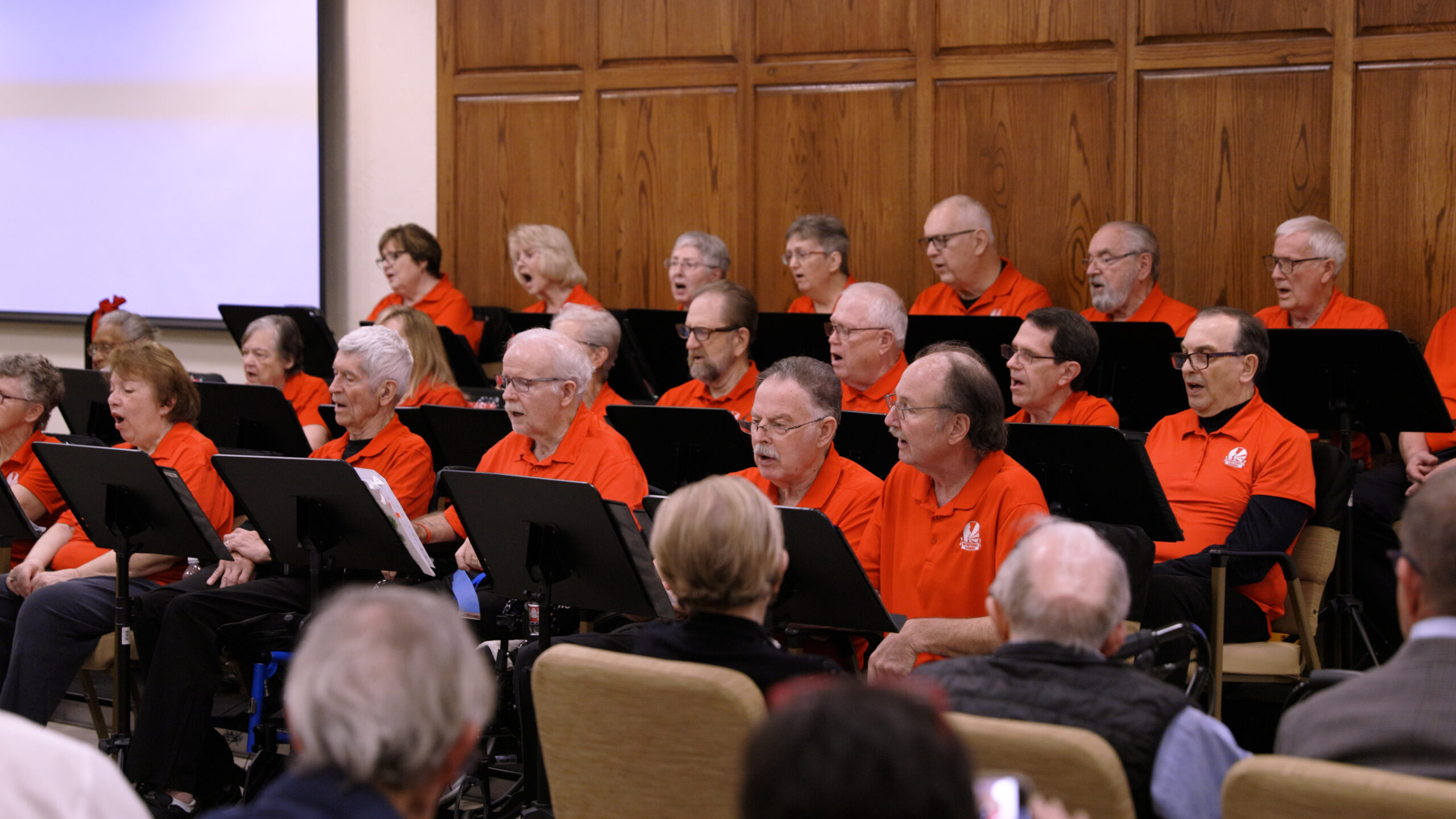 A group of people with Parkinson's sing together